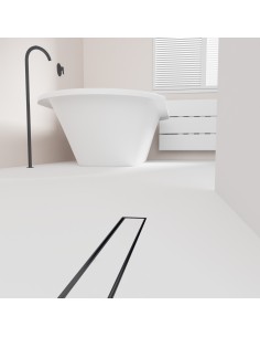 Esempio di un area doccia aperta con vasca e scarico Black integrato, con pavimento in microcemento chiaro
