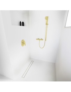Esempio di una doccia walk-in senza divisori, circondata da microcemento chiaro, con accessori in colore Gold